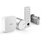 Inteligentny zamek Tedee Lock PRO (srebrny) w zestawie z mostkiem, wkładką modułową SLR 30-61/37-68 mm z zębatką (typ D) oraz białą klawiaturą Tedee 2.0 TKV2.0 PRO 