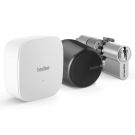 Zestaw inteligentny zamek Tedee Lock GO2 (aluminium) grafitowy z czarnym przyciskiem + Tedee Bridge Wi-Fi + wkładka modułowa SLR 30-61/30 mm z zębatką (typ B)