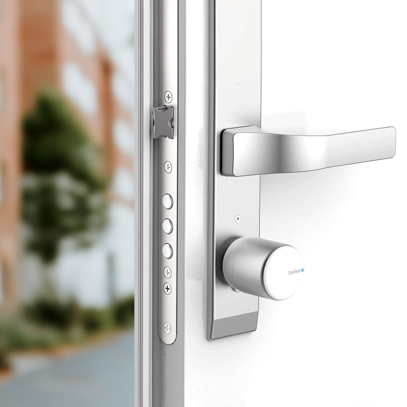 Inteligentny zamek Tedee Lock PRO – srebrny + Tedee Bridge + wkładka EXXO SMART M G61/61, z zabierakiem i gałką