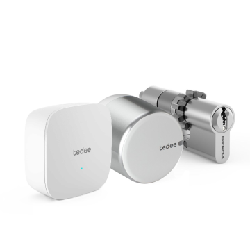 Zestaw inteligentny zamek Tedee Lock GO2 (aluminium) srebrny z białym przyciskiem + Tedee Bridge Wi-Fi + wkładka modułowa SLR 30-61/30 mm z zębatką (typ B)
